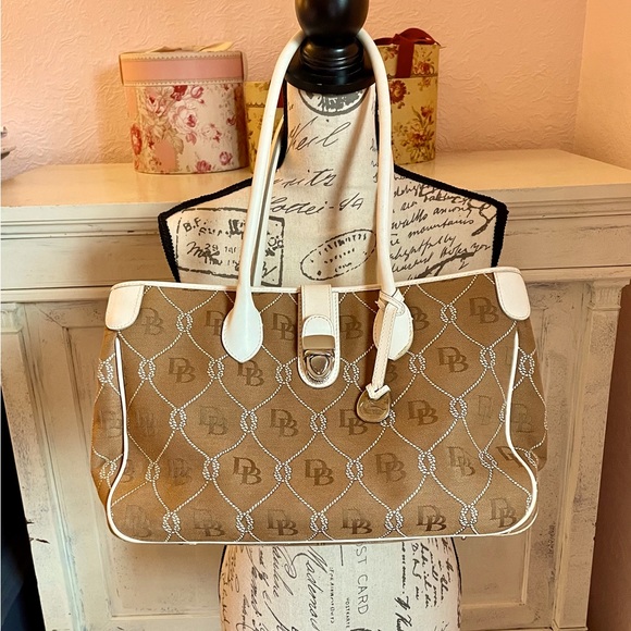 Dooney & Bourke Handbags - Preloved Dooney and Bourke Nautical Rope Tote Bag